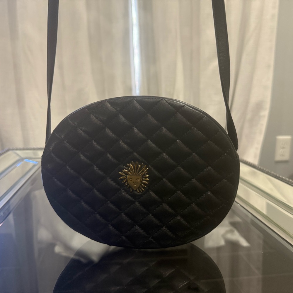 Yves Saint Laurent Black Quilted Oval Crossbody Bag